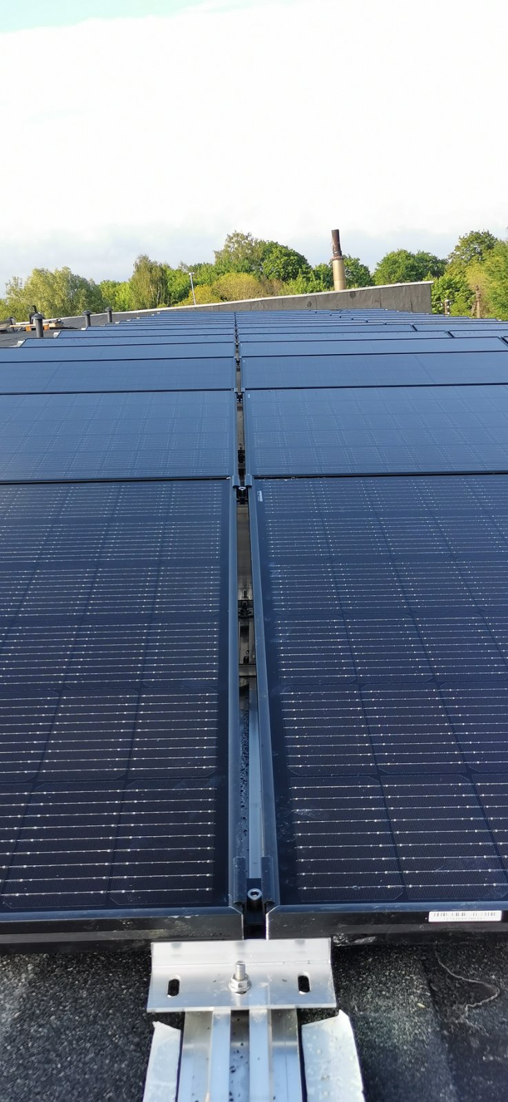 Solar park construction works on rooftop - Industrycore. 